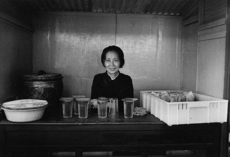woman selling tea in china shanghai