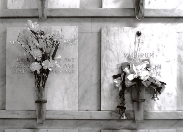 Closeup of marble niches with flowers