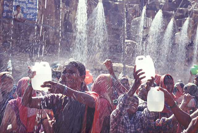 pilgrims collecting water with great difficulty Athani northern Karnataka Devadasi