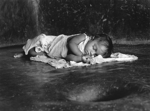 child sleeping on the floor India Kudle