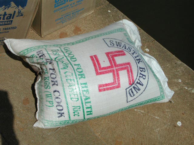 A bag of rice with red swasika symbol. Swasik Brand