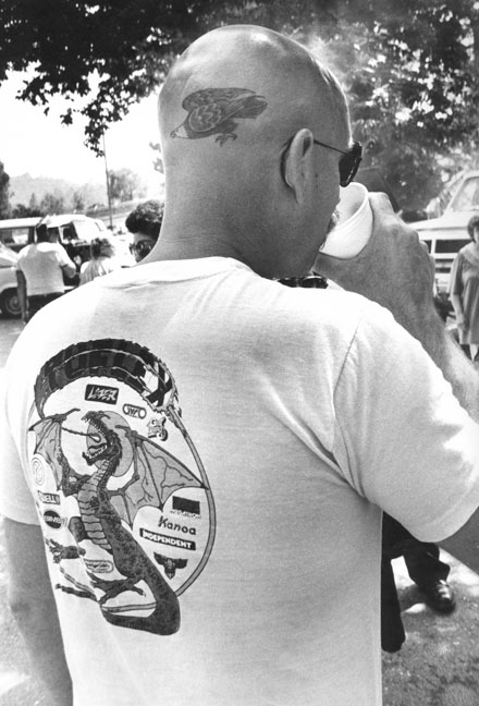 eagle tattoo in the back of the bald  head dragon t-shirt