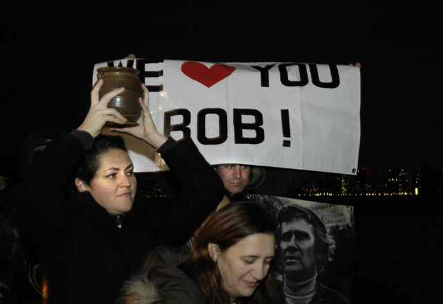 Funeral march for Bob Kohler. Urn with ashes.