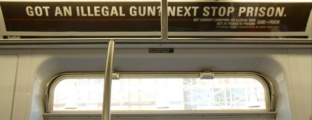 got an illegal gun? next stop prison. Poster in New York subway